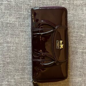 Plum colored Coach wallet